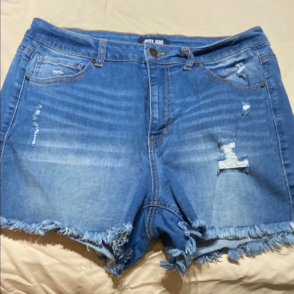 Women’s denim shorts.  Size 2xl.  With some distressing.